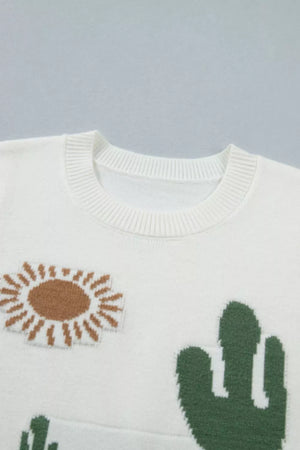 White knit sweater vest with cactus and sun graphic details and crew neck.