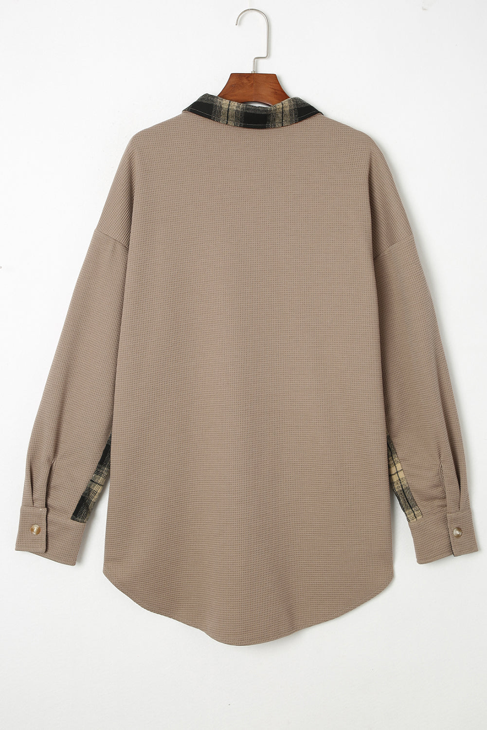 Tan waffle knit overshirt with plaid trim on collar and cuffs, button front.