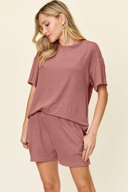 Light Mauve ribbed knit t-shirt and shorts outfit set with crew neck and short sleeves.