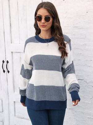 Striped knit crewneck sweater with ribbed trim in white and navy blue acrylic.