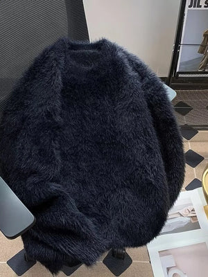 Black fluffy knit pullover sweater with crew neck and long sleeves.