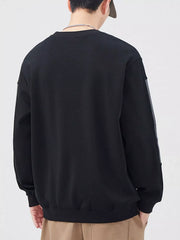 Black crewneck sweatshirt with contrasting stripe detail on sleeves