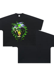 Black oversized tee with electric leopard graphic print and green lightning details.