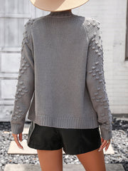 Dark Gray acrylic cardigan with textured sleeves and ribbed cuffs.