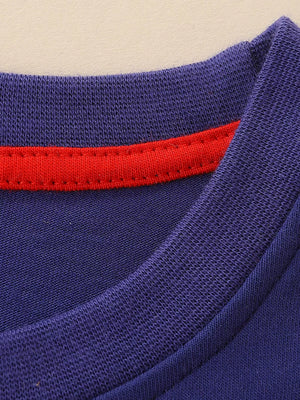 Toddler dress neckline detail: navy cotton with red trim