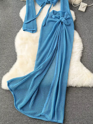 Blue crochet knit tied crop top and high slit maxi skirt set.