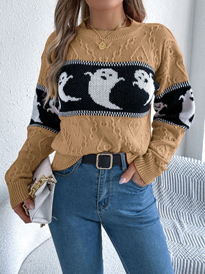 Camel cable knit crewneck sweater with ghost motif and long sleeves.