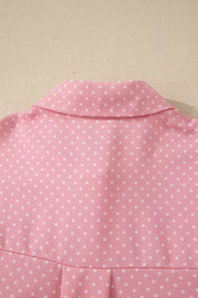 Pink polka dot print polyester button-up blouse with collar detail