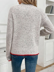 Light gray ribbed knit sweater with speckled detail and red trim