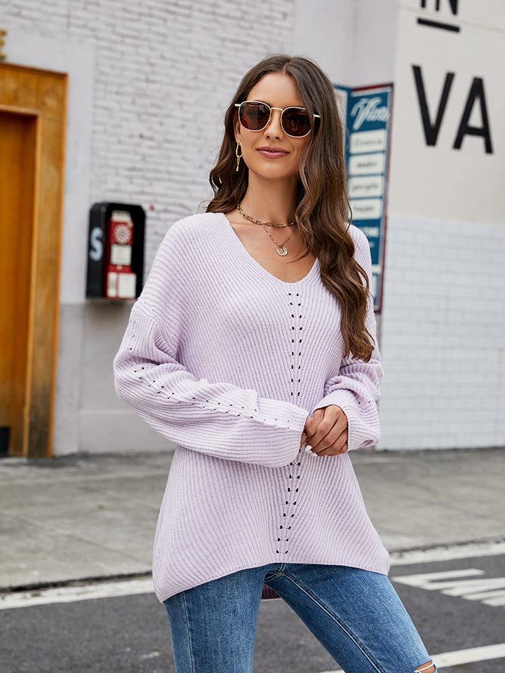 Ribbed knit sweater in Cloudy Blue with lace-up detail on neckline and sleeves.