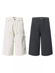 Relaxed fit utility capris in dark gray and apricot with multiple pockets.