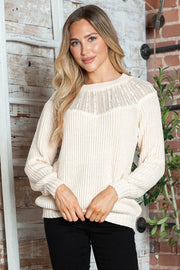 Cream ribbed knit pullover sweater with lace yoke detail and crew neck.