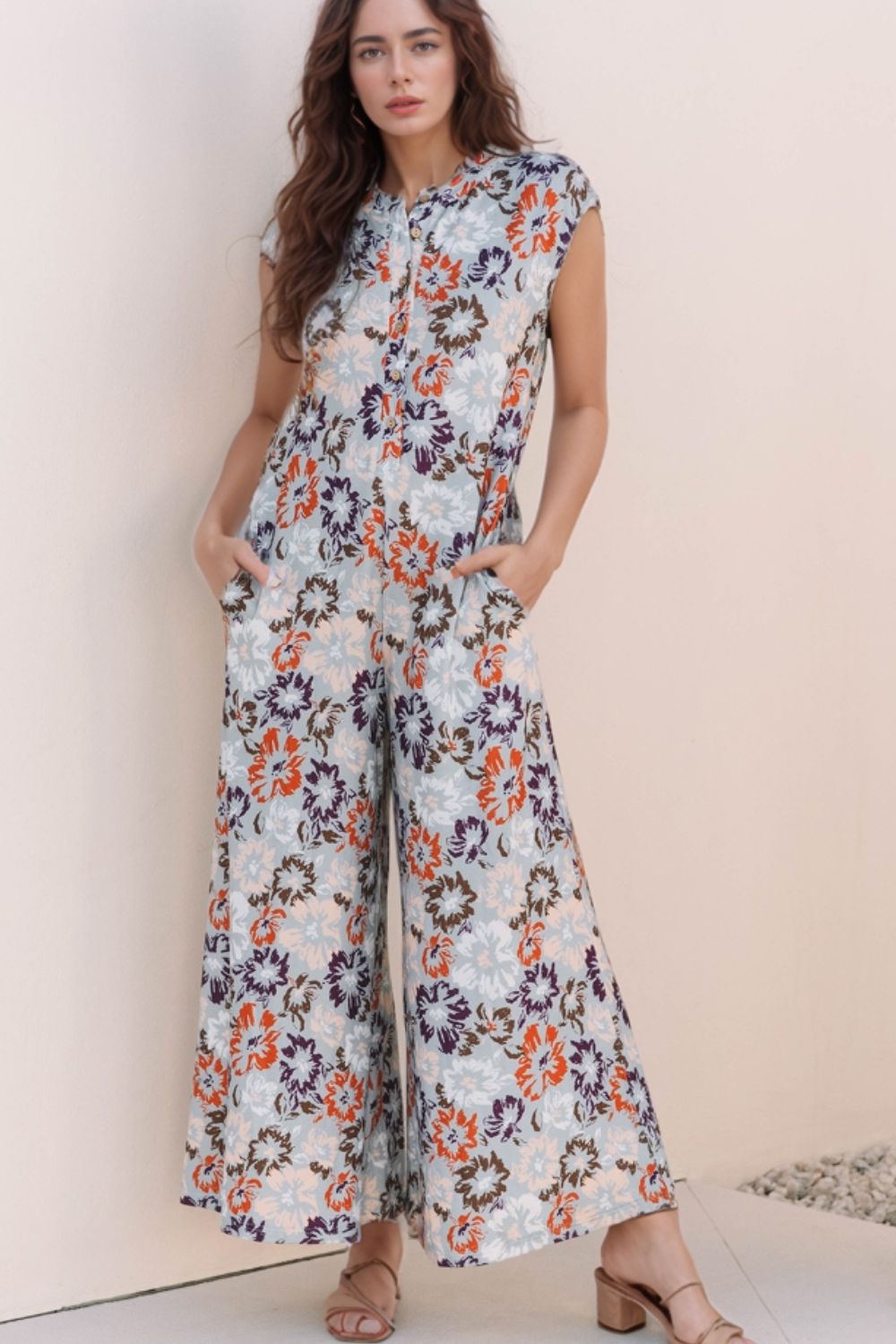 Floral cap-sleeve wide-leg jumpsuit with button detail and pockets