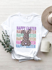 White t-shirt with leopard print Easter bunny graphic and colorful "Happy Easter" text.