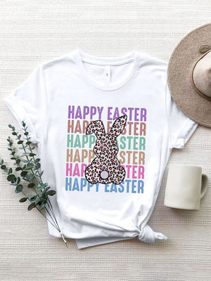 White t-shirt with leopard print Easter bunny graphic and colorful "Happy Easter" text.