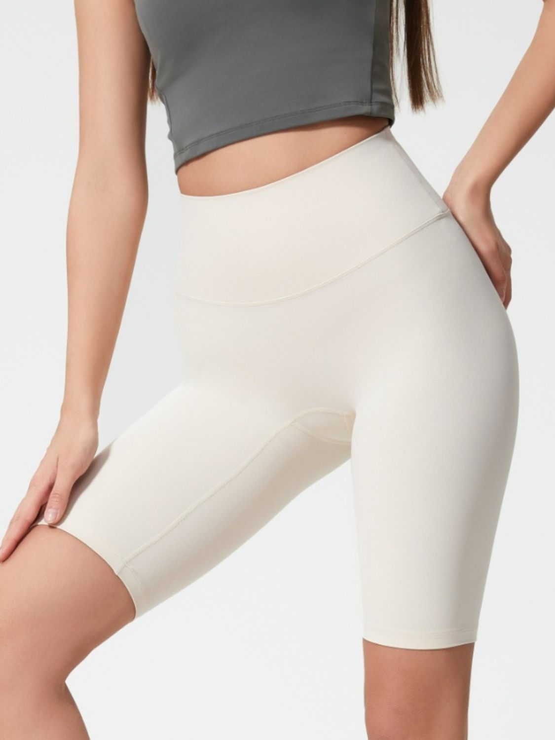 Sculpted Contour Active Cycling Shorts in light beige with a high waist and seamless design.