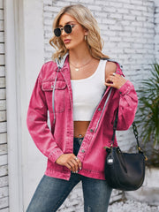 Oversized hot pink denim jacket with hood detail and button closure.