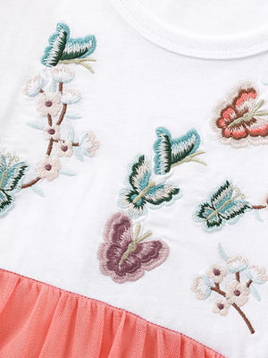 White baby dress with embroidered butterflies and flowers, coral tulle skirt.