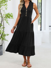 Black tiered midi dress with V-neck, decorative buttons, and pockets.