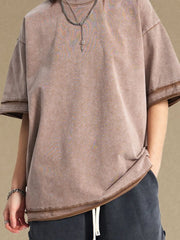Washed cotton tee in mocha with raw edge details and a relaxed fit.