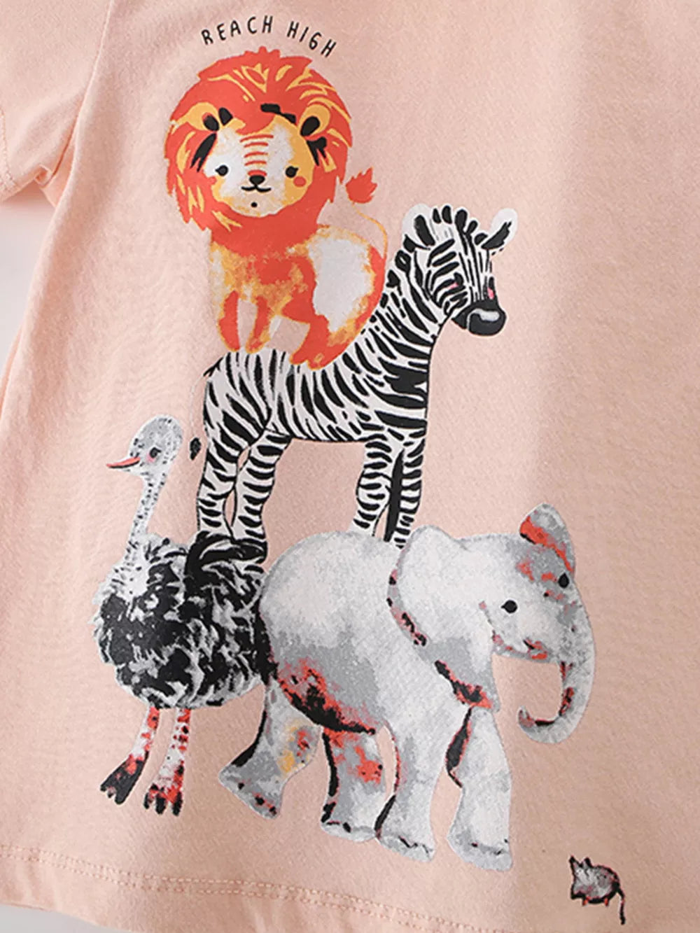 Pink cotton t-shirt with stacked animal graphic including lion, zebra, ostrich, and elephant.
