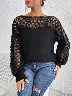 Black acrylic sweater with boatneck, lace inset yoke and balloon sleeves.