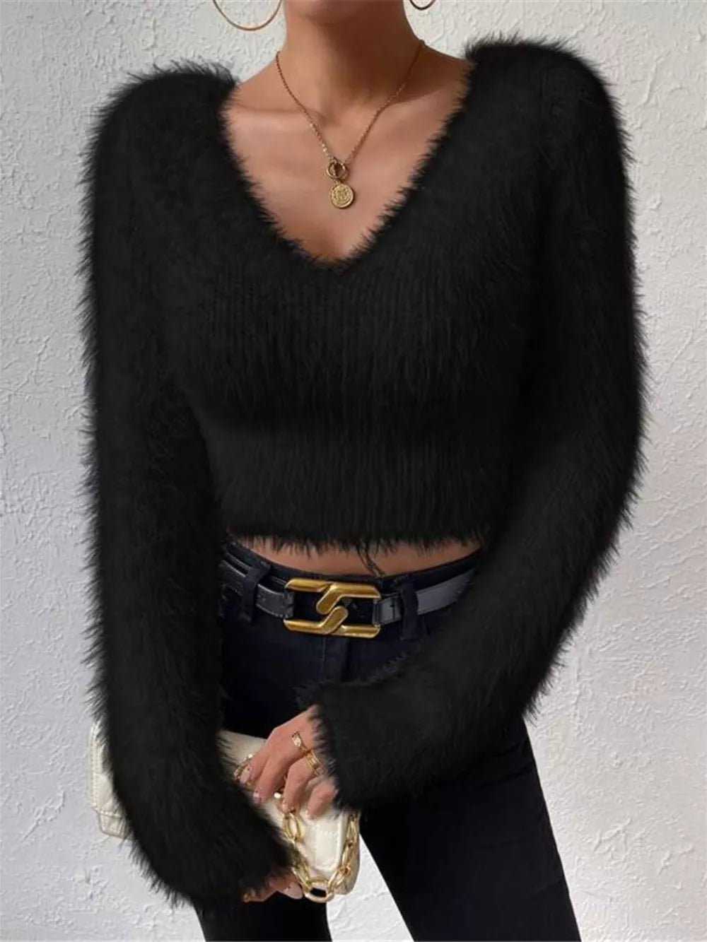 Black fluffy V-neck knit sweater with long sleeves and a cropped fit.