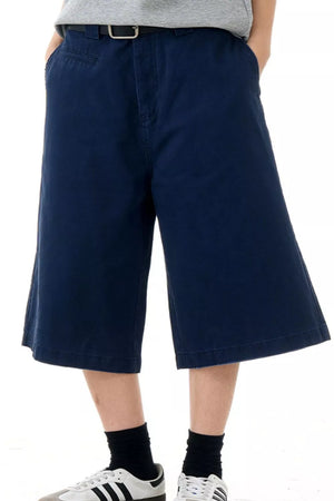 Navy blue relaxed fit bermuda shorts with belt loops and pockets.
