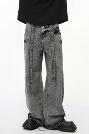 Acid wash belted palazzo jeans in dark, featuring wide legs and a casual chic style.