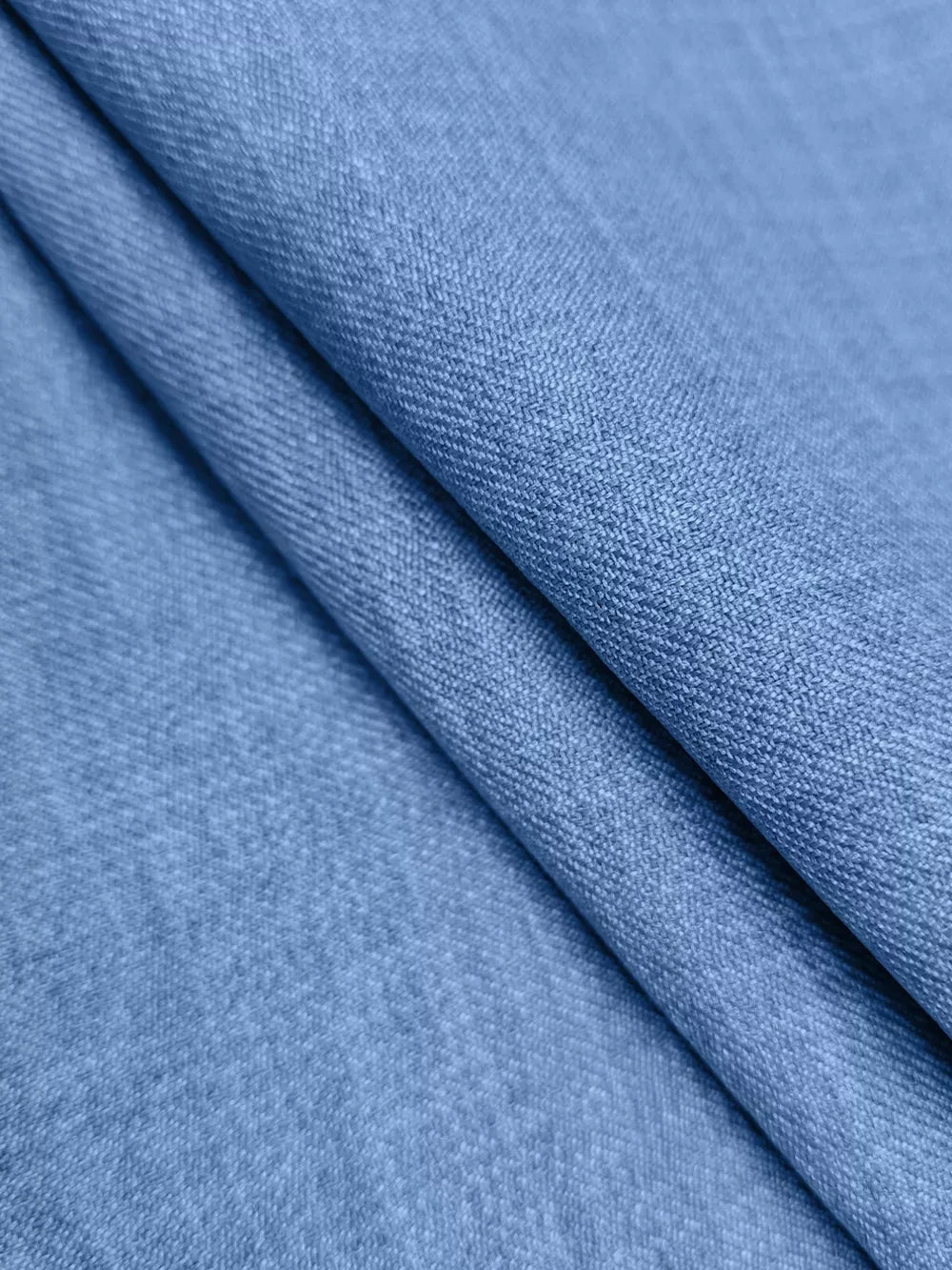 Textured blue casual shirt fabric detail