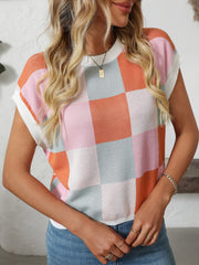 Checkerboard knit cap sleeve top in pink, orange, blue, and white.