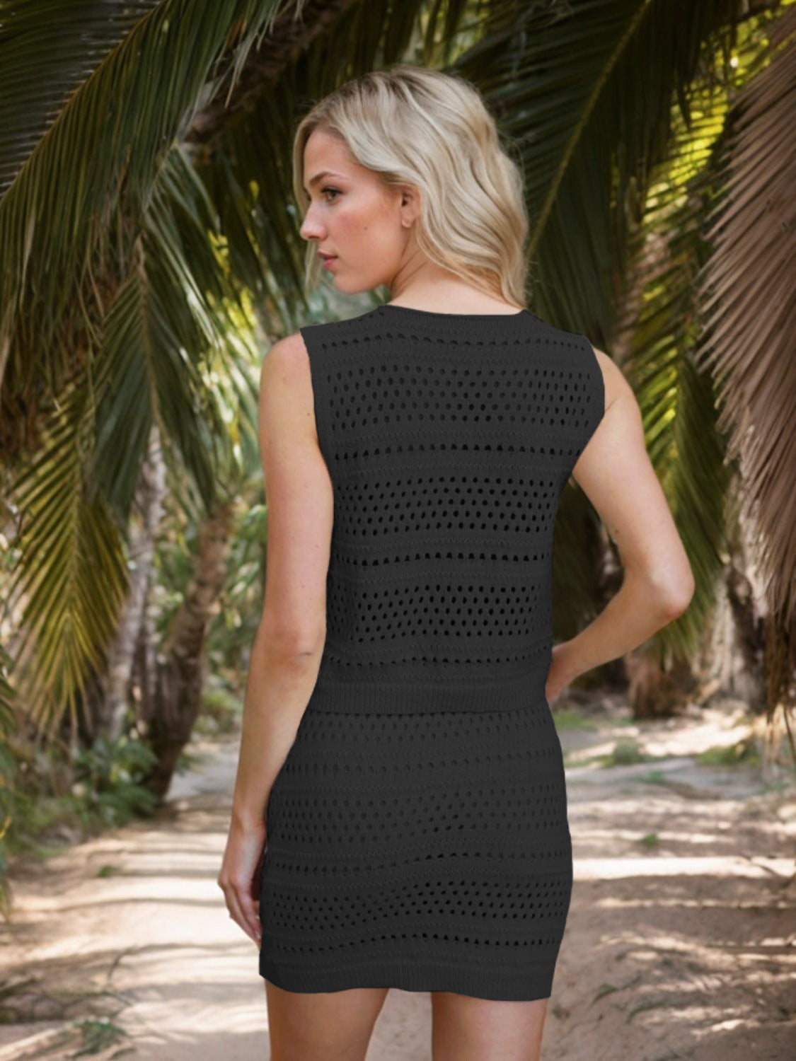 Black crochet tie-front tank and mini skirt set with open knit details.