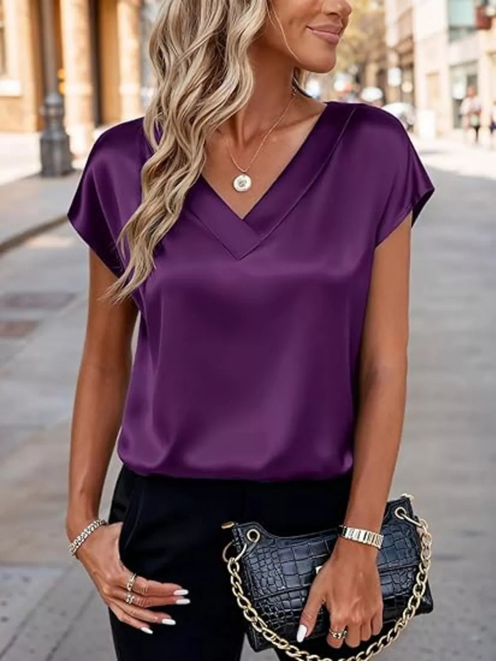 Purple satin V-neck short sleeve maternity shirt with a relaxed fit