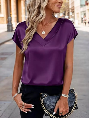 Purple satin V-neck short sleeve maternity shirt with a relaxed fit