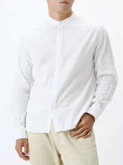Men's white 100% cotton mandarin collar shirt with button-down front and rolled sleeves.