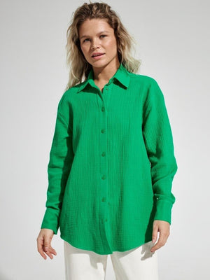Green textured cotton overshirt with relaxed fit and button-down front.