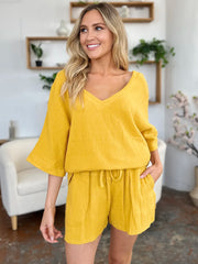 Gold textured cotton half sleeve top and drawstring shorts set