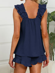 Navy ruffled top and shorts set with ruffle trim detail
