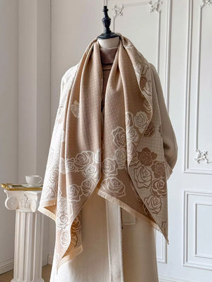 Elegant floral pattern scarf in khaki with rose print and fringed edges.