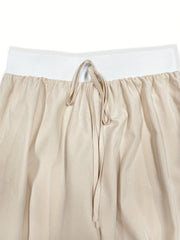 Beige wide-leg pants with elastic waistband and drawstring detail