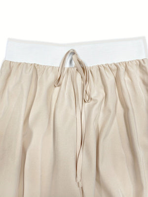 Beige wide-leg pants with elastic waistband and drawstring detail
