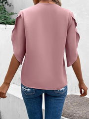 Dusty pink flutter sleeve blouse with scalloped lace trim detail.