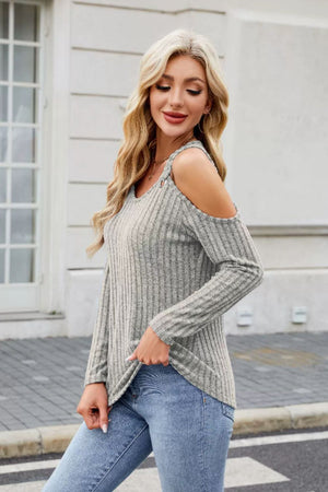 Gray ribbed cold-shoulder top with ring detail and long sleeves.