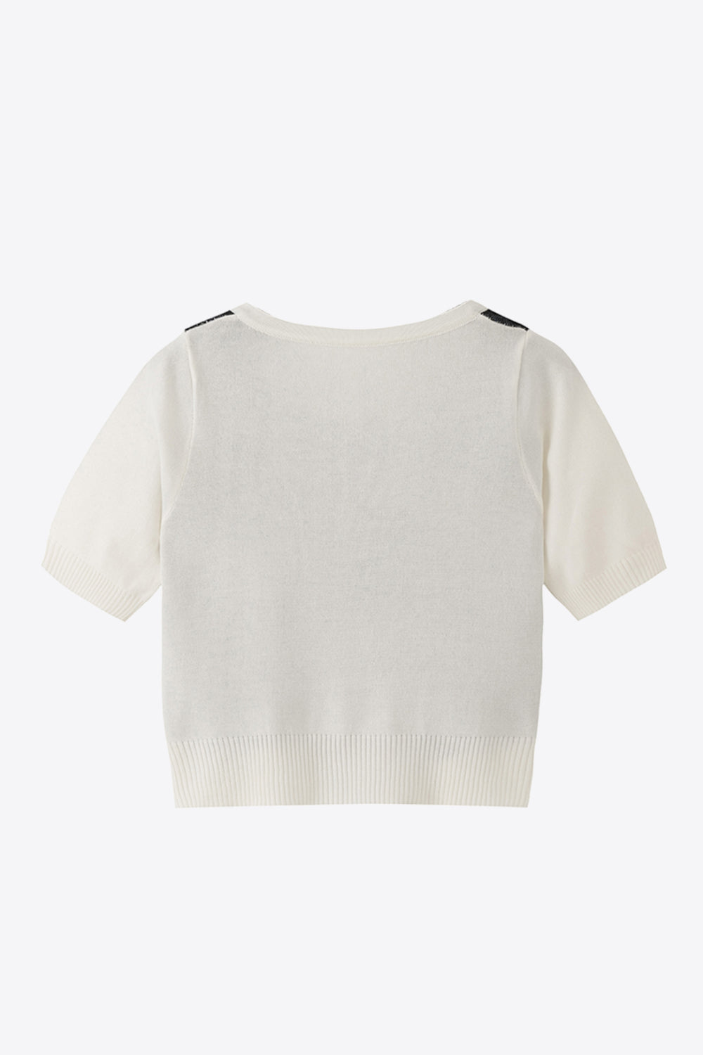 White argyle knit cropped cardigan with short sleeves and ribbed hem.