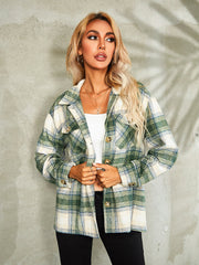 Checkered collared jacket in green and cream plaid with button front and chest pockets.