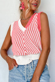Chevron knit vest with v-neck and colorblock coral and white stripes.