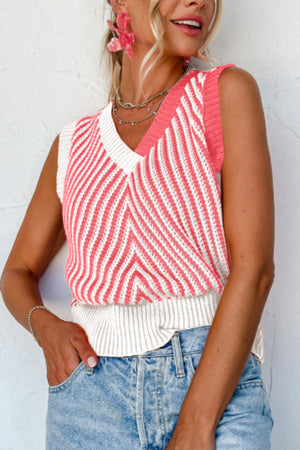 Chevron knit vest with v-neck and colorblock coral and white stripes.