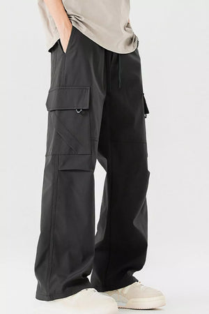 Men's black cargo pants with multiple pockets and drawstring waist.