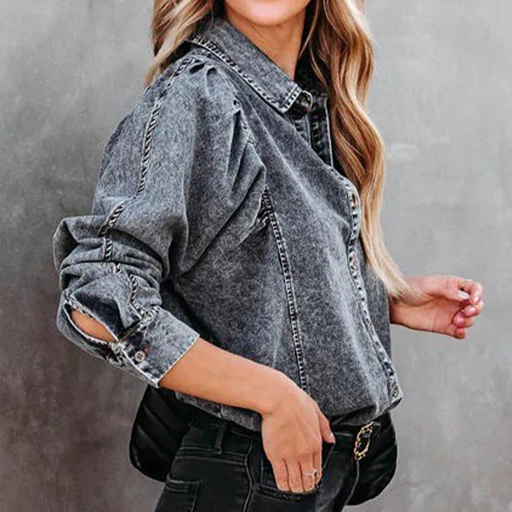Dark gray acid-washed denim shirt with puffed sleeves and button cuffs.