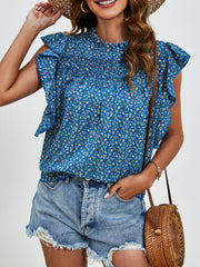Dark Blue floral blouse with smocked yoke and ruffle sleeves.